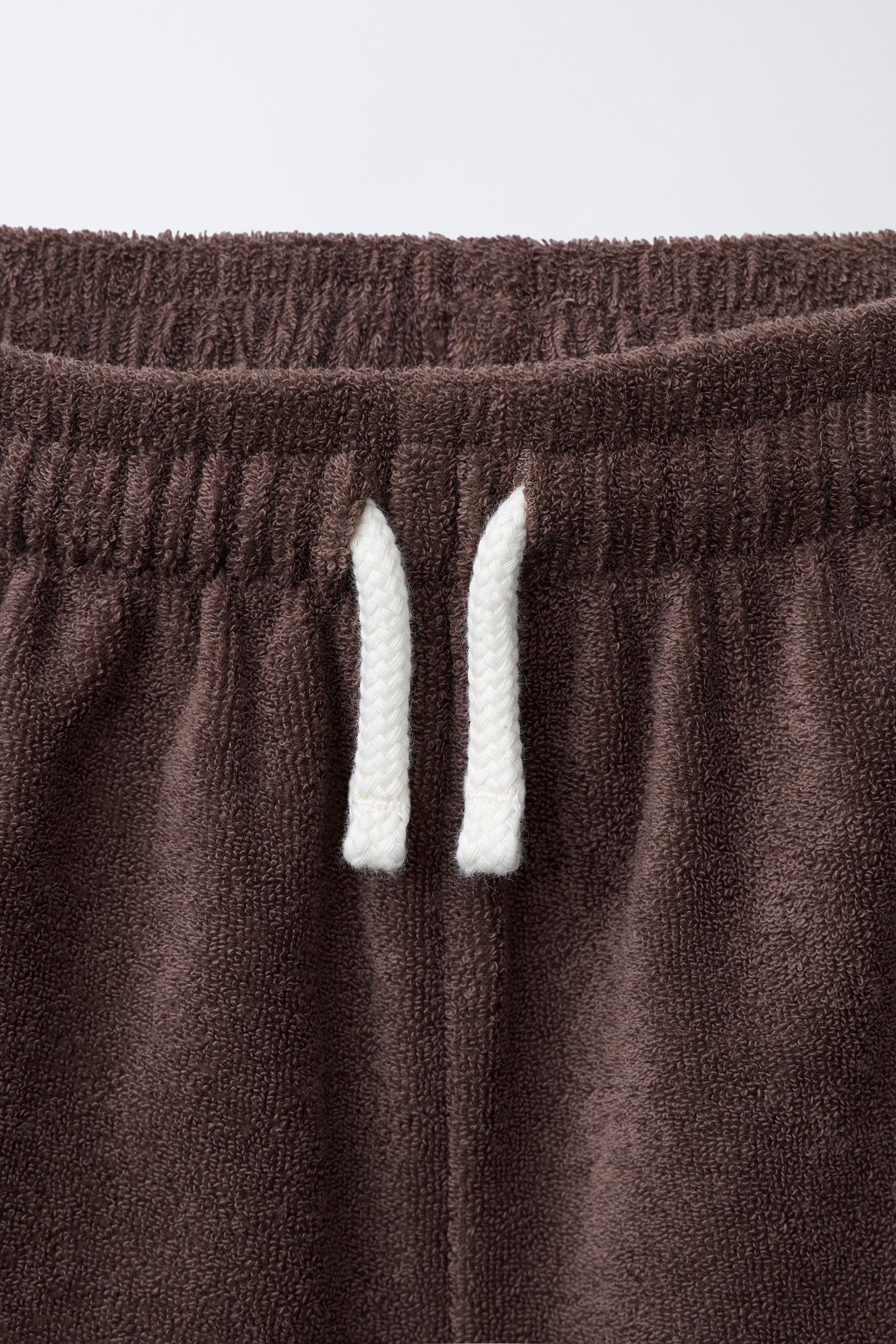 SHORT EFFET ÉPONGE AVEC ÉTIQUETTE